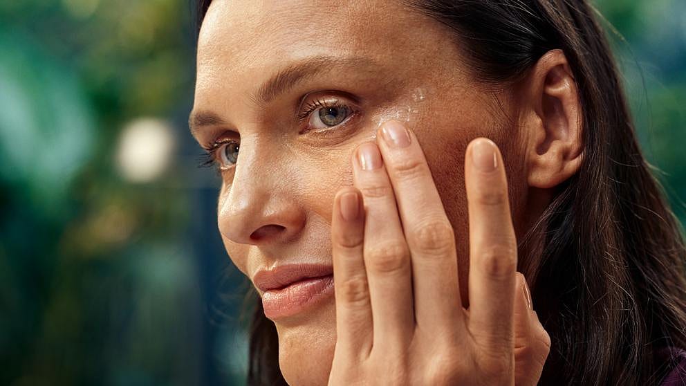 woman applying face cream